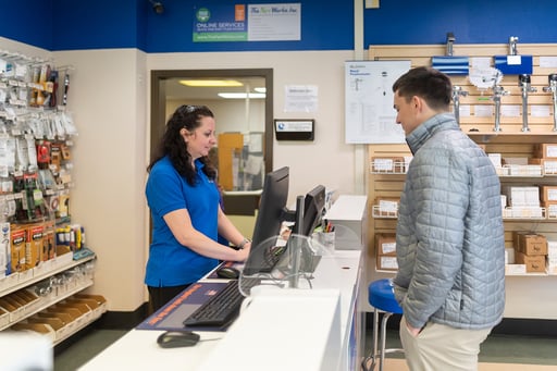 img_margaret-helping-customer-at-city-desk
