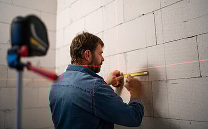 img-handyman-working-on-construction-site-measuring-w-2024-10-18-12-02-56-utc@0.25x